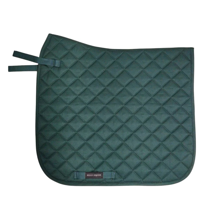 A dark green quilted horse saddle pad with a diamond pattern, featuring a small brand label at the bottom and a strap on the left side, shown against a plain white background.